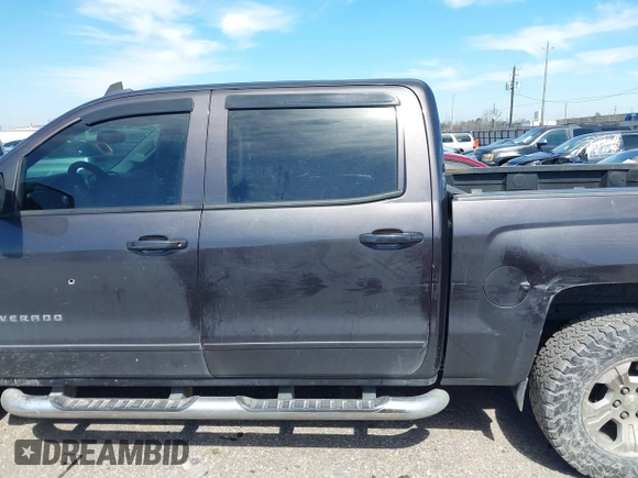 2015 Chevrolet Silverado 1500 LT with VIN 3GCUKREC2FG232302, listed as a IAAI auction lot 41652224 with 231,334 mi miles. Bid and sale history available at carsss.com. Image 14.
