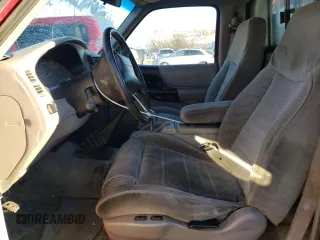 1995 Ford Ranger Splash with VIN 1FTCR10X7SPB00077, listed as a Copart auction lot 82343634 with 217,597 mi miles and Salvage Title. Bid and sale history available at carsss.com. Image 7.