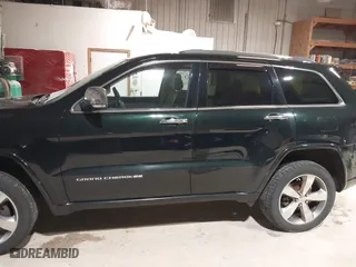 2014 Jeep Grand Cherokee Overland with VIN 1C4RJFCGXEC162109, listed as a IAAI auction lot 41943979 with 147,788 mi miles. Bid and sale history available at carsss.com. Image 15.