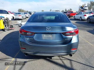 2015 Mazda Mazda6 i Sport with VIN JM1GJ1U57F1179440, listed as a IAAI auction lot 41361324 with 93,422 mi miles. Bid and sale history available at carsss.com. Image 16.