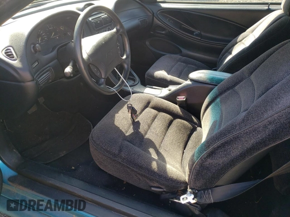 1994 Ford Mustang with VIN 1FALP4442RF186105, listed as a Copart auction lot 74677924 with 185,072 mi miles and Clean title. Bid and sale history available at DreamBid. Image 7.