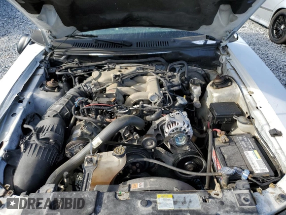 2002 Ford Mustang Deluxe with VIN 1FAFP44492F121223, listed as a Copart auction lot 62474065 with 128,984 mi miles and Salvage title. Bid and sale history available at DreamBid. Image 11.