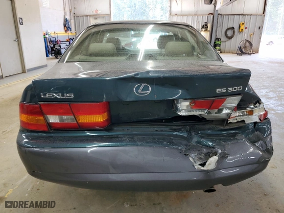 1997 Lexus ES 300 Luxury Sport Sdn with VIN JT8BF22GXV0010912, listed as a Copart auction lot 74691214 with 111,733 mi miles and Salvage Title. Bid and sale history available at carsss.com. Image 6.