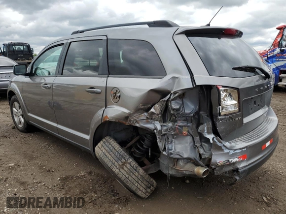 2012 Dodge Journey SXT z VIN 3C4PDCBG3CT213515, wystawiony jako Copart lot #58128845 z przebiegiem 208 152 mil mil oraz Szkoda całkowita • Salvage title. Historia ofert i sprzedaży dostępna na DreamBid. Obrazek 2.