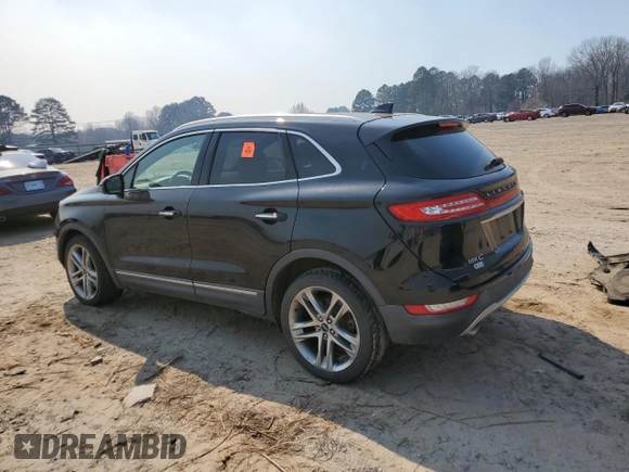 2019 Lincoln MKC Reserve with VIN 5LMCJ3D99KUL02590, listed as a Copart auction lot 48011365 with 100,976 mi miles and Salvage title. Bid and sale history available at DreamBid. Image 2.