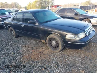 2005 Ford Crown Victoria LX z VIN 2FAFP74W45X127975, wystawiony jako IAAI lot #41521670 z przebiegiem 289 438 mil mil oraz . Historia ofert i sprzedaży dostępna na DreamBid. Obrazek 1.