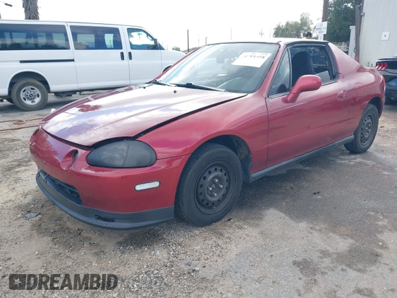 1995 Honda del Sol S with VIN JHMEG1144SS003580, listed as a IAAI auction lot 41701598 with 276,749 mi miles. Bid and sale history available at carsss.com. Image 2.