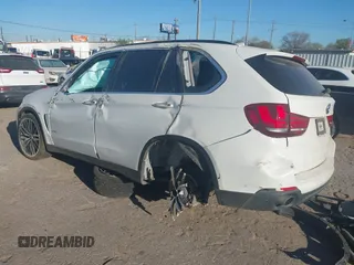 2016 BMW X5 sDrive35i with VIN 5UXKR2C52G0R69101, listed as a IAAI auction lot 41807519 with 1 mi miles. Bid and sale history available at carsss.com. Image 3.