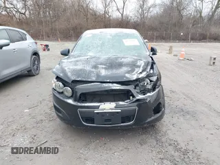 2014 Chevrolet Sonic LS with VIN 1G1JA6SH6E4139131, listed as a IAAI auction lot 41727625 with 97,241 mi miles and . Bid and sale history available at DreamBid. Image 12.