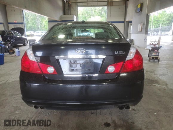 2007 Infiniti M x z VIN JNKAY01F37M456012, wystawiony jako Copart lot #58978165 z przebiegiem 290 083 mil mil oraz Szkoda całkowita • Salvage title. Historia ofert i sprzedaży dostępna na DreamBid. Obrazek 6.