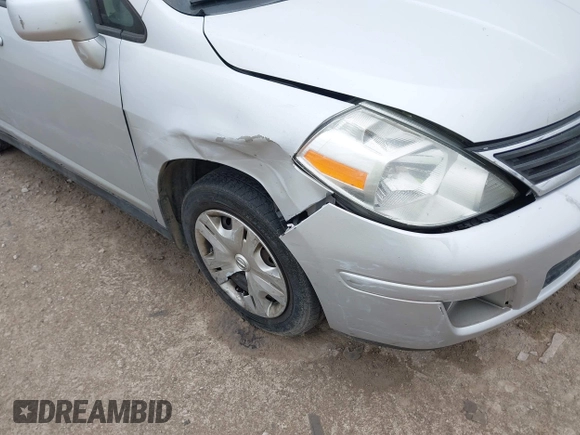 2010 Nissan Versa S with VIN 3N1BC1AP9AL404584, listed as a IAAI auction lot 42367293 with 158,377 mi miles and . Bid and sale history available at DreamBid. Image 17.