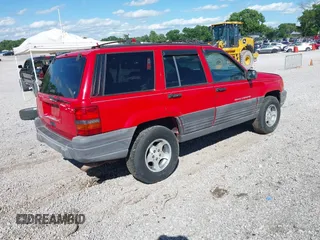1998 Jeep Grand Cherokee Laredo with VIN 1J4FX58S9WC137514, listed as a IAAI auction lot 42305247 with 228,669 mi miles and . Bid and sale history available at DreamBid. Image 4.