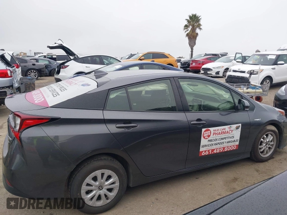 2022 Toyota Prius L Eco with VIN JTDKAMFU3N3190079, listed as a IAAI auction lot 41771356 with 52,607 mi miles and . Bid and sale history available at DreamBid. Image 13.