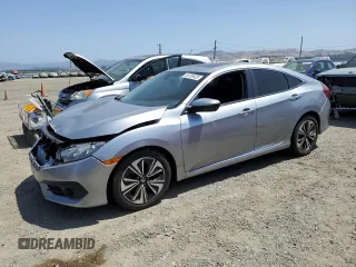 2017 Honda Civic EX-L z VIN 19XFC1F7XHE207946, wystawiony jako Copart lot #58730425 z przebiegiem 58 564 mil mil oraz Szkoda całkowita • Salvage title. Historia ofert i sprzedaży dostępna na DreamBid. Obrazek 1.