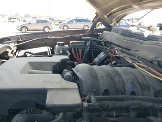 2014 Chevrolet Silverado 1500 LT with VIN 3GCUKREC4EG515072, listed as a IAAI auction lot 43320619 with 219,329 mi miles and . Bid and sale history available at DreamBid. Image 17.