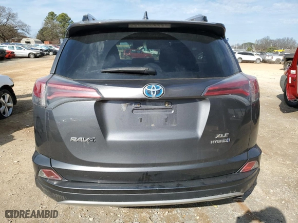 2016 Toyota RAV4 Hybrid XLE with VIN JTMRJREV7GD058459, listed as a Copart auction lot 45479505 with 218,153 mi miles and Salvage Title. Bid and sale history available at carsss.com. Image 6.