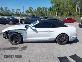 2019 Ford Mustang EcoBoost z VIN 1FATP8UHXK5205196, wystawiony jako IAAI lot #41688651 z przebiegiem 75 642 mil mil oraz . Historia ofert i sprzedaży dostępna na DreamBid. Obrazek 14.