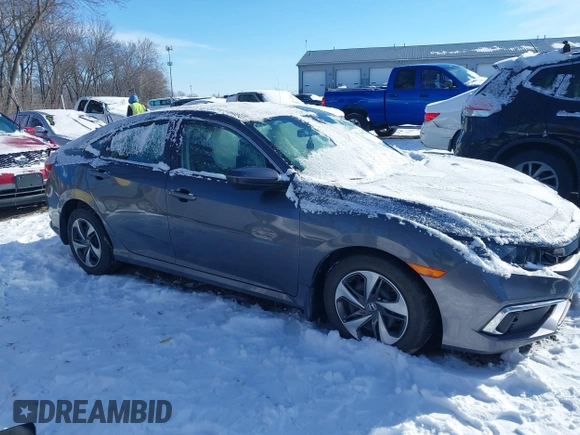 2020 Honda Civic LX z VIN 2HGFC2F64LH580766, wystawiony jako IAAI lot #41597161 z przebiegiem 10 828 mil mil oraz . Historia ofert i sprzedaży dostępna na DreamBid. Obrazek 14.