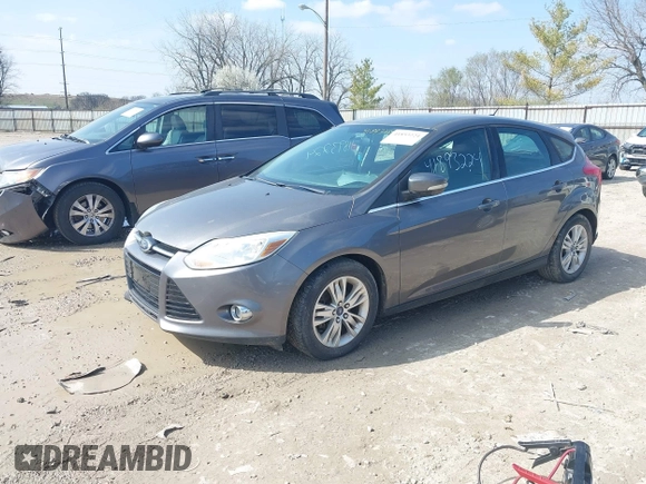 2012 Ford Focus SEL with VIN 1FAHP3M23CL460208, listed as a IAAI auction lot 41893224 with 146,553 mi miles. Bid and sale history available at carsss.com. Image 2.