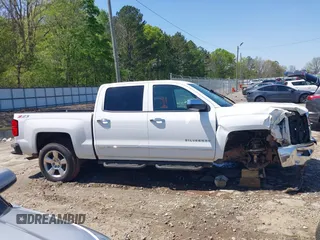 2014 Chevrolet Silverado 1500 LTZ with VIN 3GCUKSECXEG446055, listed as a IAAI auction lot 41988435 with 165,833 mi miles and . Bid and sale history available at DreamBid. Image 14.