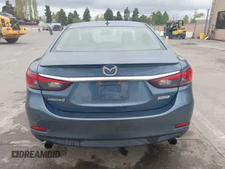 2014 Mazda 6 i Grand Touring with VIN JM1GJ1W64E1133729, listed as a IAAI auction lot 42050222 with 112,464 mi miles and . Bid and sale history available at DreamBid. Image 16.