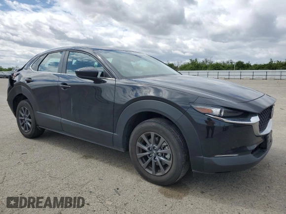2023 Mazda CX-30 S with VIN 3MVDMBAM7PM555455, listed as a Copart auction lot 51268345 with 34,552 mi miles and Salvage Title. Bid and sale history available at carsss.com. Image 4.