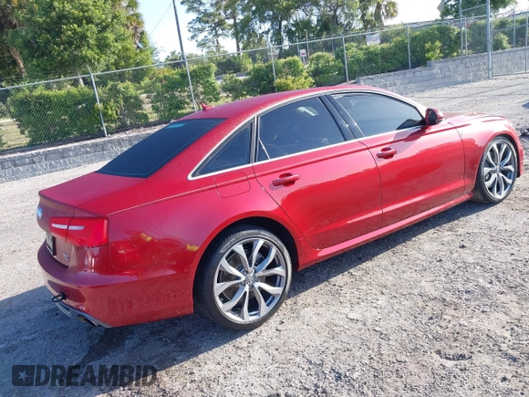 2014 Audi A6 Prestige with VIN WAUHGAFC6EN060054, listed as a IAAI auction lot 42006061 with 42,381 mi miles and . Bid and sale history available at DreamBid. Image 4.