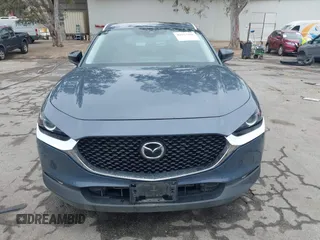 2022 Mazda CX-30 S Carbon Edition with VIN 3MVDMBCL0NM456154, listed as a IAAI auction lot 42153202 with 40,372 mi miles and . Bid and sale history available at DreamBid. Image 12.