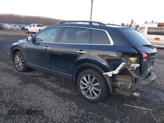 2014 Mazda CX-9 Grand Touring with VIN JM3TB3DV7E0429276, listed as a IAAI auction lot 41415446 with 94,939 mi miles and . Bid and sale history available at DreamBid. Image 3.
