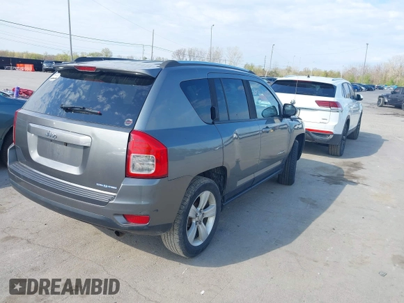 2013 Jeep Compass Sport with VIN 1C4NJCBB2DD174668, listed as a IAAI auction lot 42104977 with 213,123 mi miles. Bid and sale history available at carsss.com. Image 4.