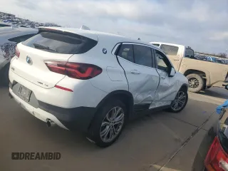 2022 BMW X2 sDrive28i z VIN WBXYH9C02N5U10663, wystawiony jako Copart lot #47361955 z przebiegiem 72 319 mil mil oraz Szkody całkowita. Historia ofert i sprzedaży dostępna na DreamBid. Obrazek 4.