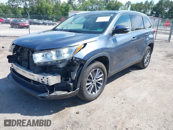 2019 Toyota Highlander SE with VIN 5TDKZRFH1KS290412, listed as a IAAI auction lot 42272229 with 74,212 mi miles and . Bid and sale history available at DreamBid. Image 18.