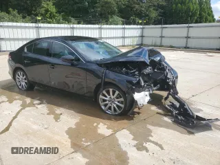 2020 Mazda 3 Premium with VIN 3MZBPBEMXLM125534, listed as a Copart auction lot 71675304 with 39,219 mi miles and Clean Title. Bid and sale history available at DreamBid. Image 4.
