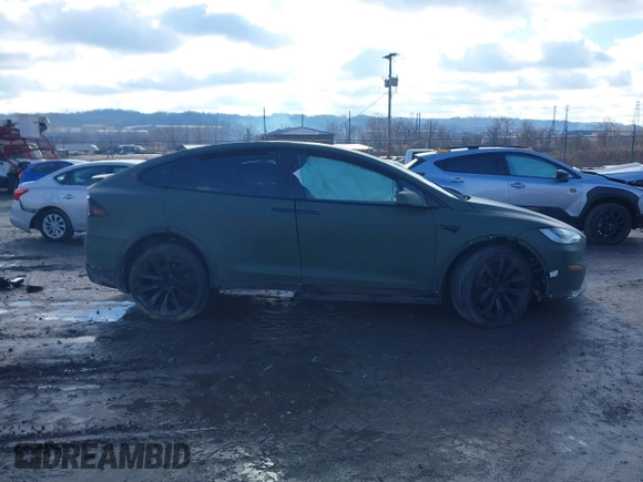 2022 Tesla Model X Plaid z VIN 7SAXCBE6XNF358023, wystawiony jako IAAI lot #41683857 z przebiegiem 42 821 mil mil oraz . Historia ofert i sprzedaży dostępna na DreamBid. Obrazek 14.