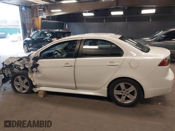 2014 Mitsubishi Lancer SE with VIN JA32V2FW1EU018927, listed as a IAAI auction lot 42059116 with 148,874 mi miles and . Bid and sale history available at carsss.com. Image 14.