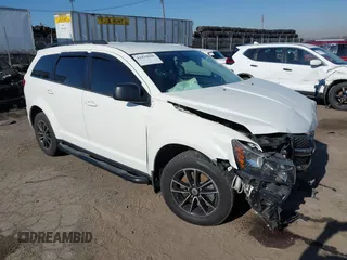2018 Dodge Journey SE with VIN 3C4PDCAB4JT498082, listed as a IAAI auction lot 41829026 with 70,167 mi miles. Bid and sale history available at carsss.com. Image 1.