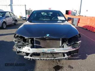 2018 BMW 5 Series 540i with VIN WBAJE5C58JG918692, listed as a IAAI auction lot 41665415 with 61,261 mi miles and . Bid and sale history available at carsss.com. Image 13.