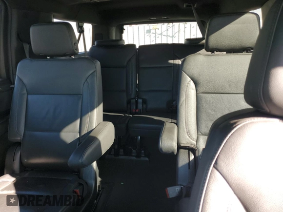 2023 Chevrolet Suburban LT with VIN 1GNSCCKD1PR124986, listed as a Copart auction lot 87432904 with 105,026 mi miles and Salvage Title. Bid and sale history available at DreamBid. Image 10.
