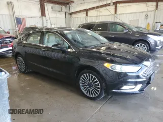 2017 Ford Fusion SE z VIN 3FA6P0H9XHR119202, wystawiony jako Copart lot #55774645 z przebiegiem 93 525 mil mil oraz Nie do naprawy • Non repairable. Historia ofert i sprzedaży dostępna na DreamBid. Obrazek 4.