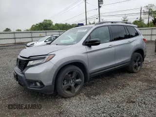 2019 Honda Passport Elite z VIN 5FNYF8H07KB030315, wystawiony jako Copart lot #55330725 z przebiegiem 45 954 mil mil oraz Szkody całkowita. Historia ofert i sprzedaży dostępna na DreamBid. Obrazek 1.