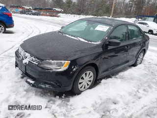 2014 Volkswagen Jetta Sedan S with VIN 3VW2K7AJ1EM217710, listed as a IAAI auction lot 41660771 with 73,680 mi miles. Bid and sale history available at carsss.com. Image 2.