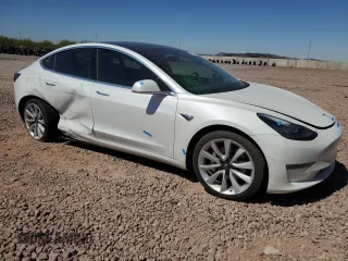 2020 Tesla Model 3 Long Range with VIN 5YJ3E1EB8LF712308, listed as a Copart auction lot 53265405 with 65,262 mi miles and Salvage Title. Bid and sale history available at DreamBid. Image 4.