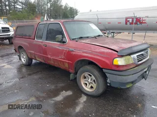 1998 Mazda B-Series 2WD Truck SE with VIN 4F4YR16C5WTM35045, listed as a IAAI auction lot 41655123 with 242,946 mi miles. Bid and sale history available at carsss.com. Image 1.