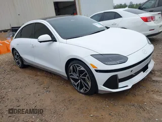 2023 Hyundai Ioniq 6 Limited z VIN KMHM54AA2PA051520, wystawiony jako IAAI lot #41957155 z przebiegiem Nie podano mil oraz . Historia ofert i sprzedaży dostępna na DreamBid. Obrazek 1.