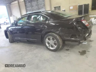 2014 Ford Taurus SEL z VIN 1FAHP2E80EG128686, wystawiony jako Copart lot #57158255 z przebiegiem 69 529 mil mil oraz Szkoda całkowita • Salvage title. Historia ofert i sprzedaży dostępna na DreamBid. Obrazek 2.