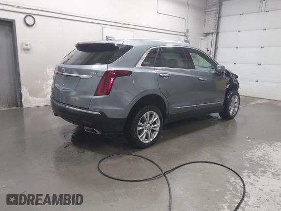 2021 Cadillac XT5 AWD Luxury with VIN 1GYKNBR42MZ165944, listed as a IAAI auction lot 42062750 with 51,592 mi miles and . Bid and sale history available at DreamBid. Image 4.