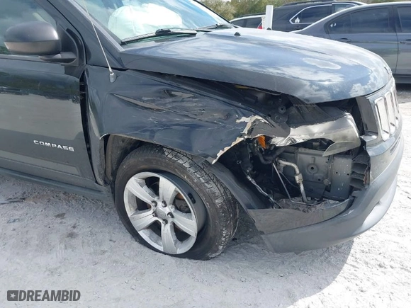 2014 Jeep Compass Sport with VIN 1C4NJCBB1ED722113, listed as a IAAI auction lot 41525045 with 106,502 mi miles. Bid and sale history available at carsss.com. Image 6.