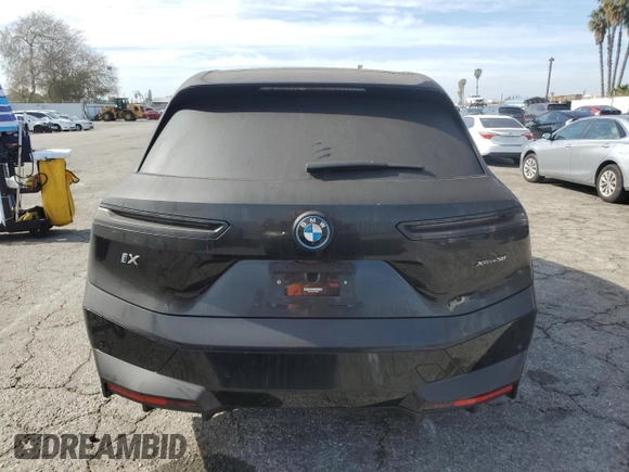 2023 BMW iX xDrive50 with VIN WB523CF0XPCL59062, listed as a Copart auction lot 43813935 with 7,788 mi miles and Salvage Title. Bid and sale history available at carsss.com. Image 6.