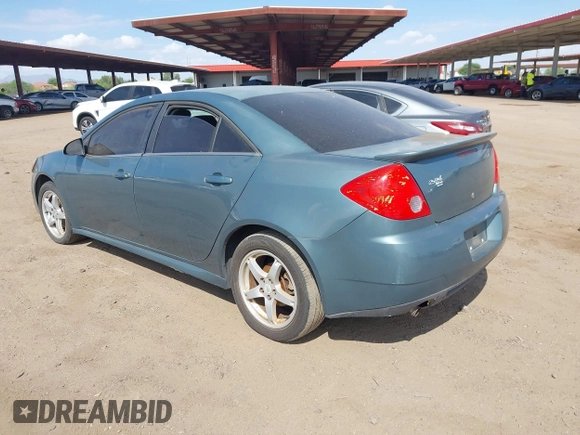 2009 Pontiac G6 1SB with VIN 1G2ZJ57K594261692, listed as a IAAI auction lot 42802373 with 200,469 mi miles and . Bid and sale history available at DreamBid. Image 3.