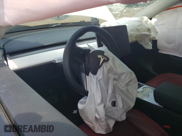 2024 Tesla Model Y with VIN 7SAYGDED9RF133701, listed as a Copart auction lot 64060785 with Not provided miles and Salvage title. Bid and sale history available at DreamBid. Image 8.